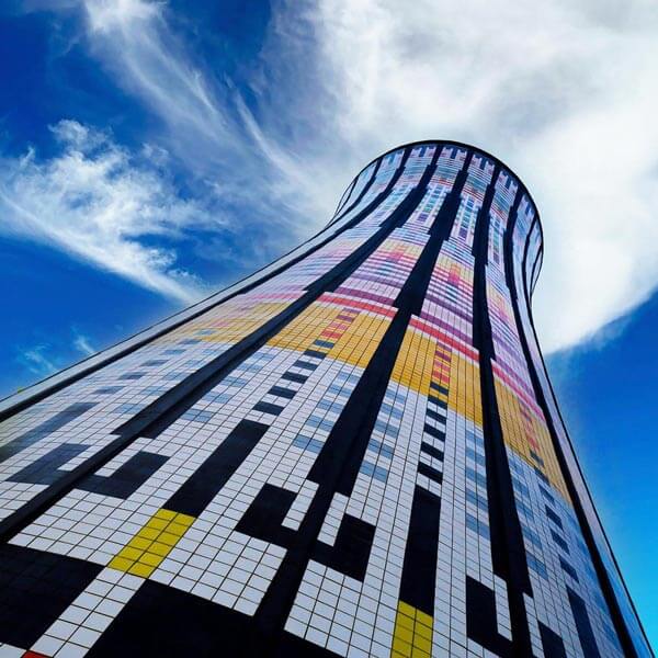 bazzea restaura torre arcobalemno milano quartiere isola rainbow tower